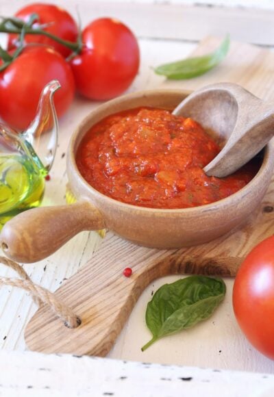 Mediterranean cuisine. Provencal sauce of ripe tomatoes, olive oil and basil and ingredients