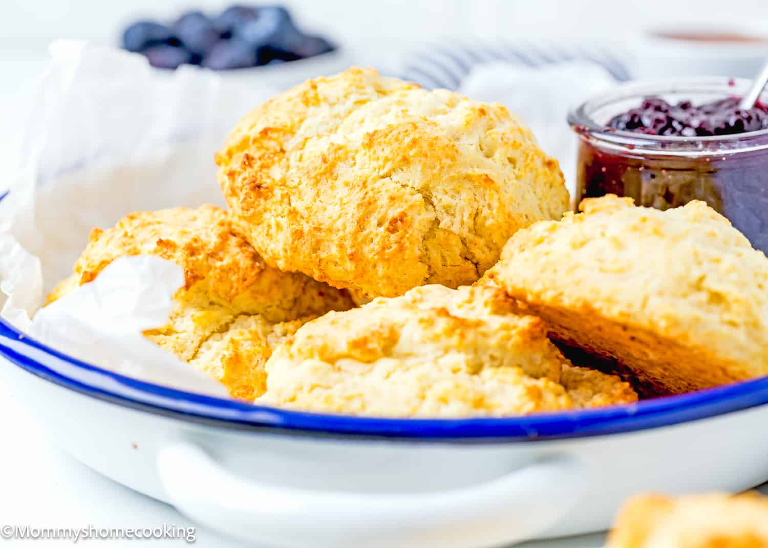 BEST homemade Drop Biscuits in a serving plate with jam.