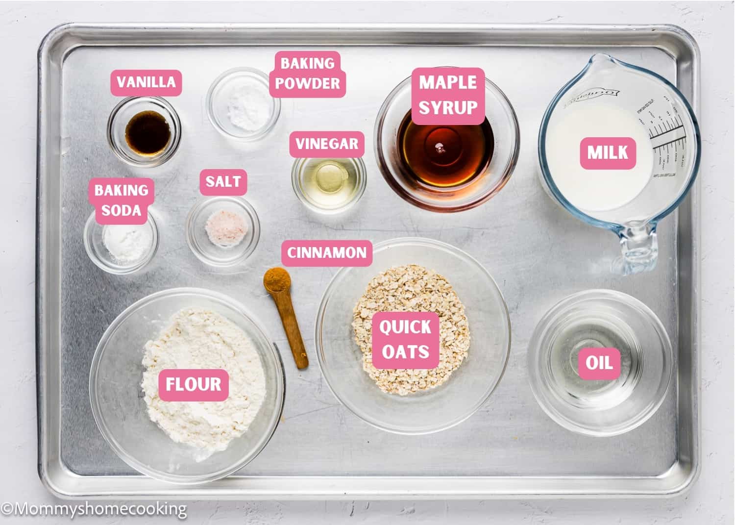 A metal tray with ingredients to make healthy Easy Oat Muffins , no eggs, no dairy, no sugar.
