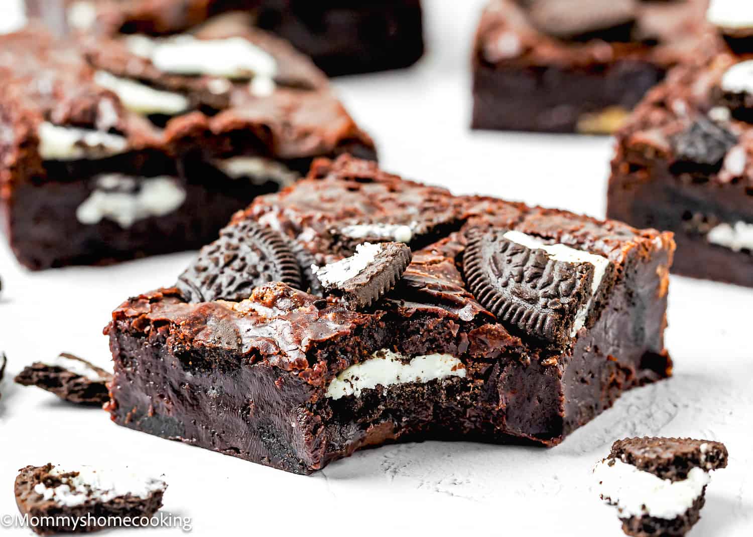 Indulge in these eggless Oreo brownies topped with a layer of delightful Oreos.