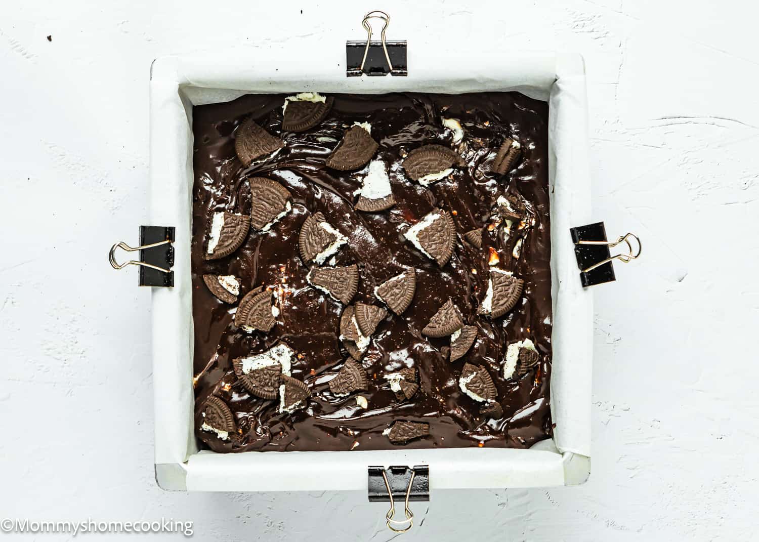 eggless oreo brownie batter in a baking dish.