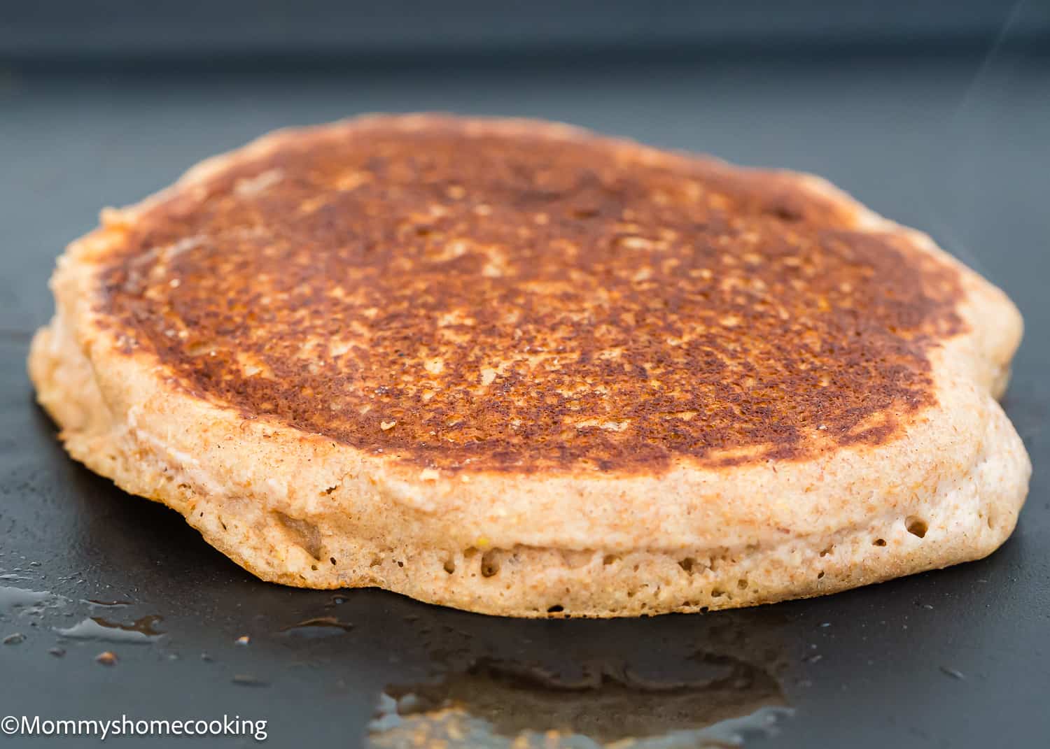 a Whole Wheat Pancake on a griddle.
