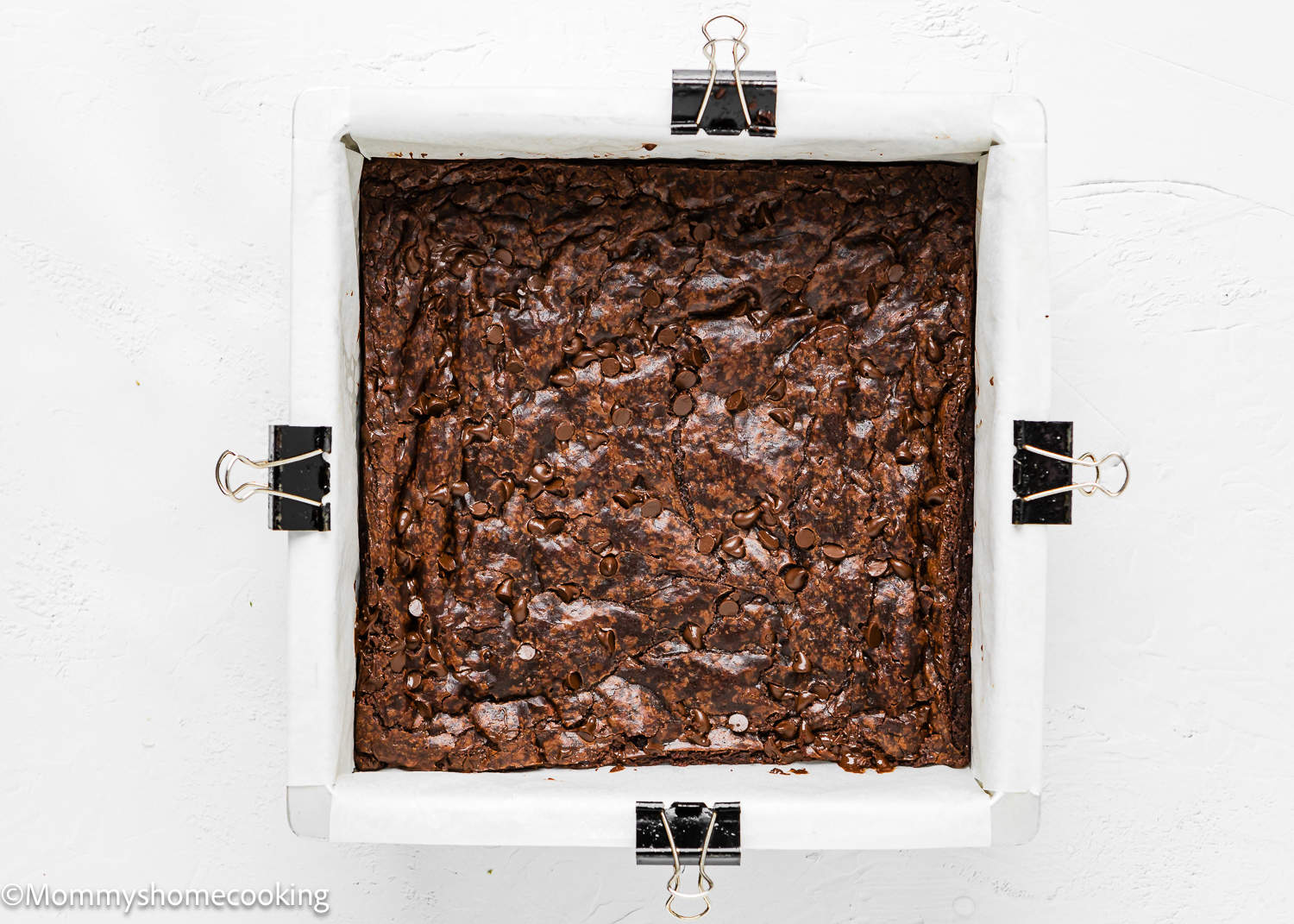 baked boxed brownie made without eggs in a baking pan.