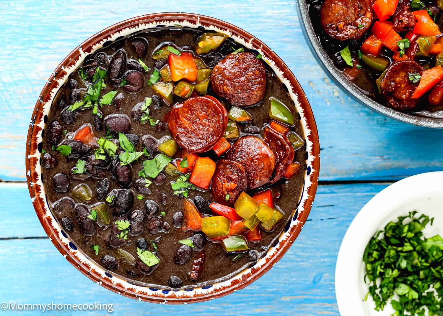 Venezuelan Black Bean Soup (Sopa de Caraotas) with chorizo in a bowl.