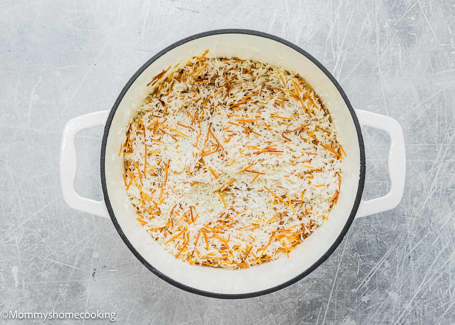 toasted rice and vermicelli in a dutch oven pot.