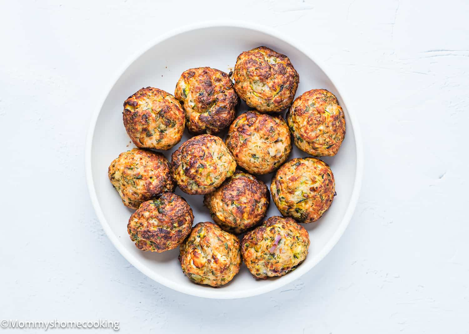 cooked egg-free meatballs in a plate.