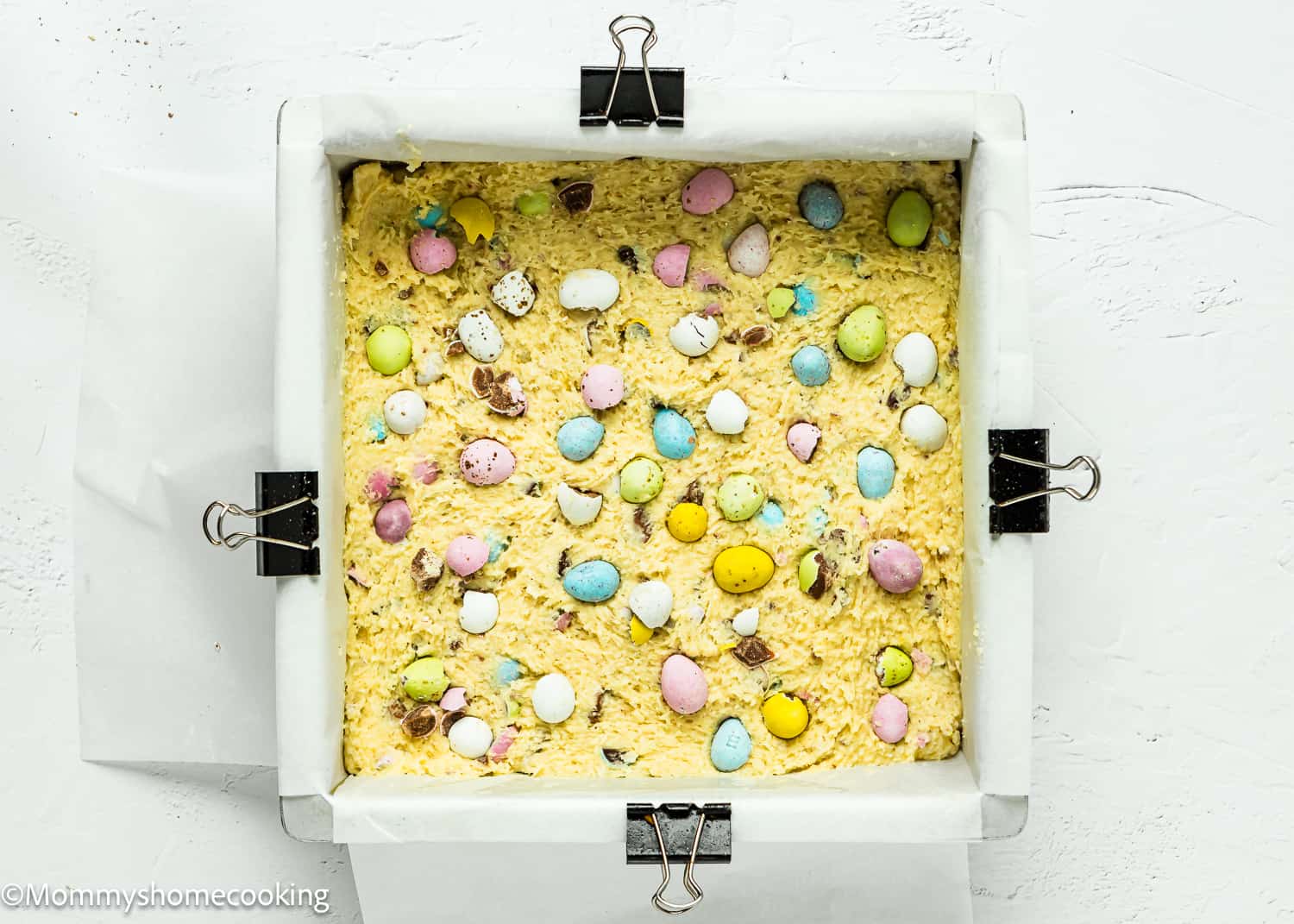 unbaked Easter Blondies (Egg-Free) in a square baking pan.