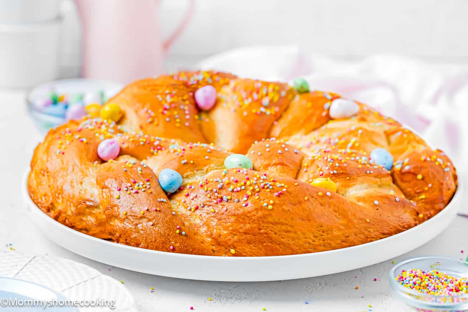 whole Easter Sweet Bread on a white plate.