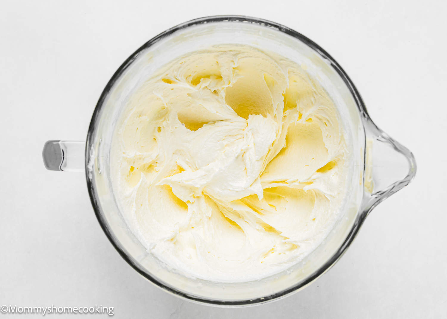 butter, sugar and oil creamed together in a bowl.