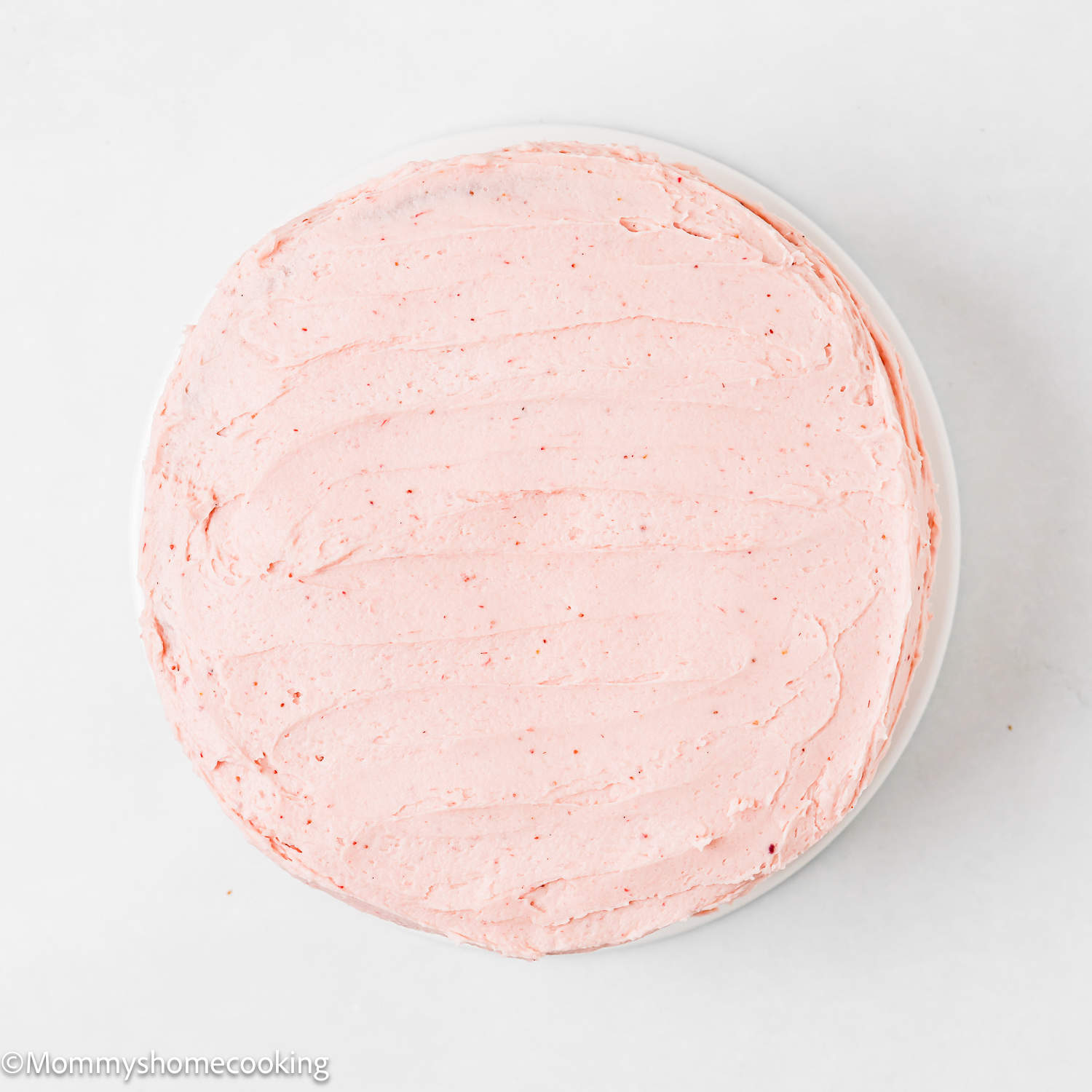 a 2 layer Easy Fresh Strawberry Cake covered with strawberry frosting.