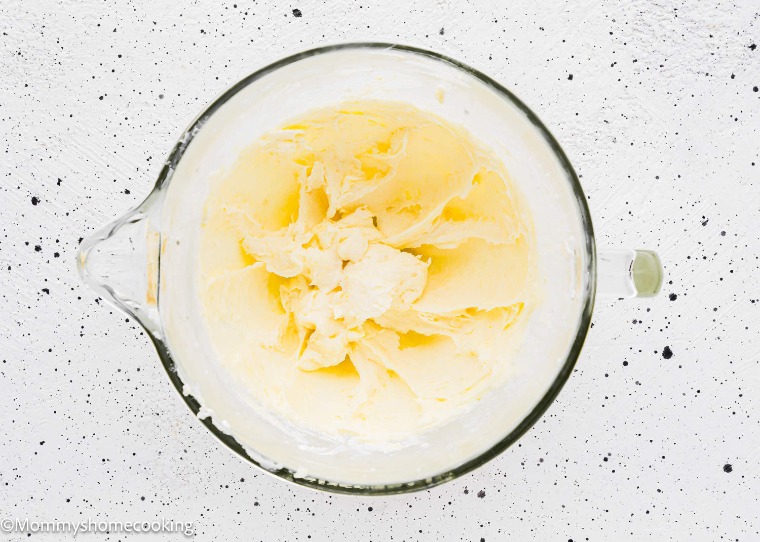 butter and sugar creamed together in a stand mixer bowl.