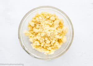 crumbs for Eggless Lemon blueberry Loaf Cake batter in bowl.