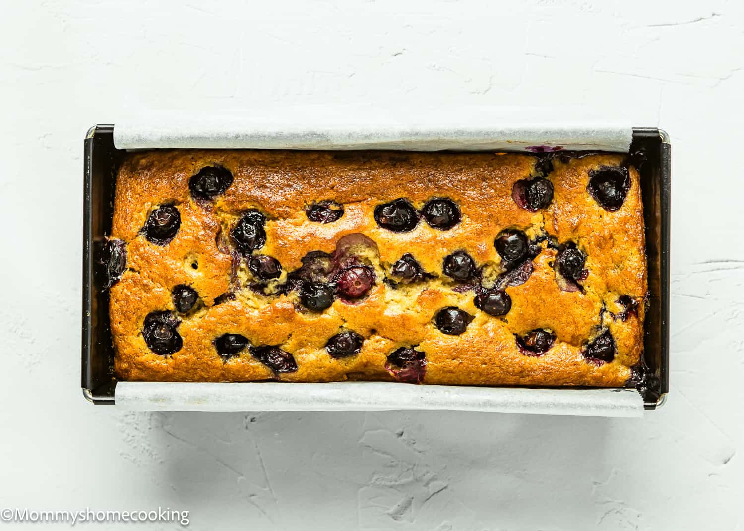 baked Blueberry Banana Bread in a loaf pan.