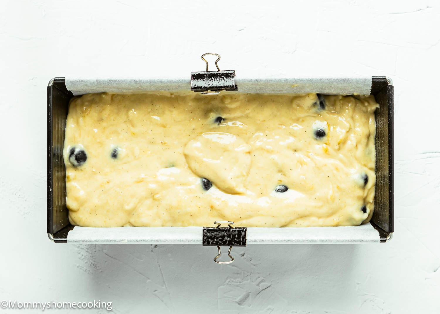 Blueberry Banana Bread batter in a loaf pan.