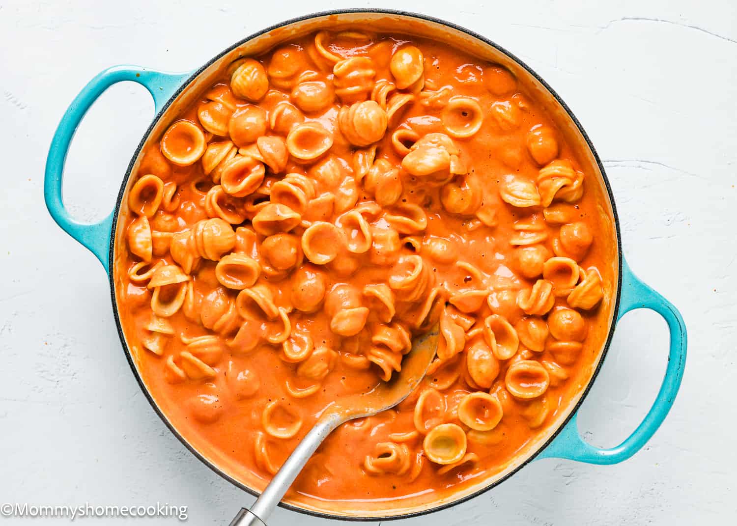 a skillet with easy creamy tomato pasta.