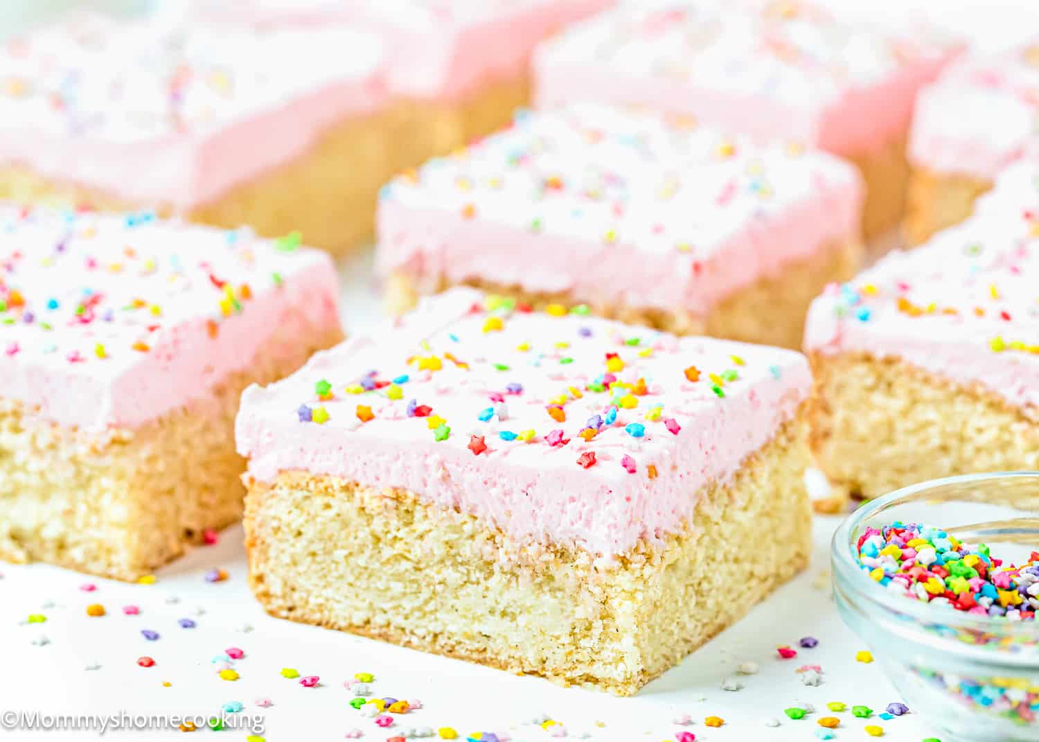 Egg-Free Sugar Cookie bars over a white surface.