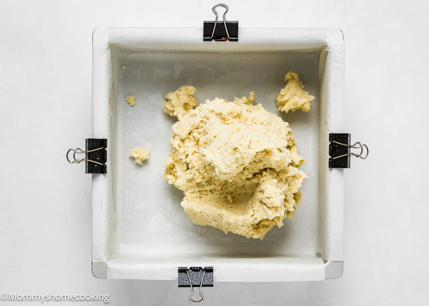 egg-free sugar cookie dough into a baking pan.
