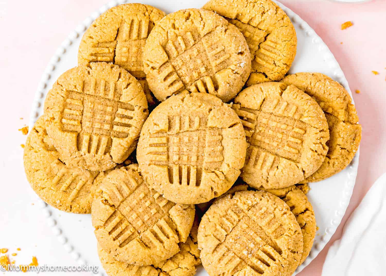 Eggless Peanut Butter Cookies on a white plate.
