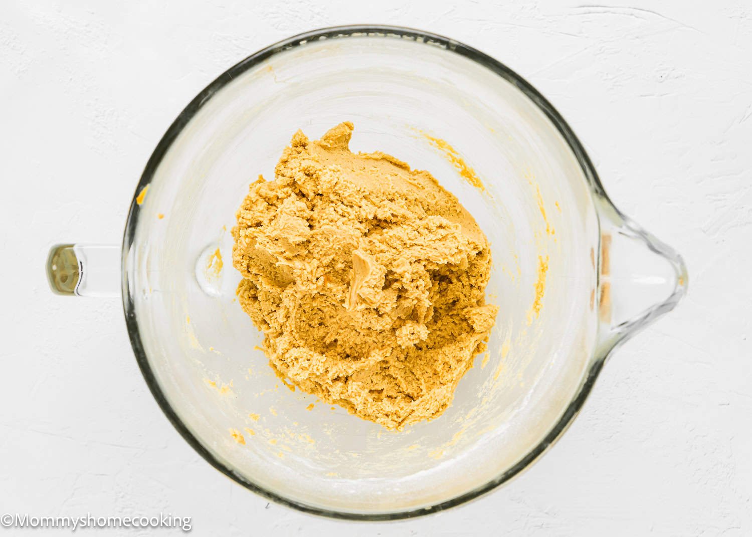 Eggless Peanut Butter Cookie batter in a stand mixer bowl.