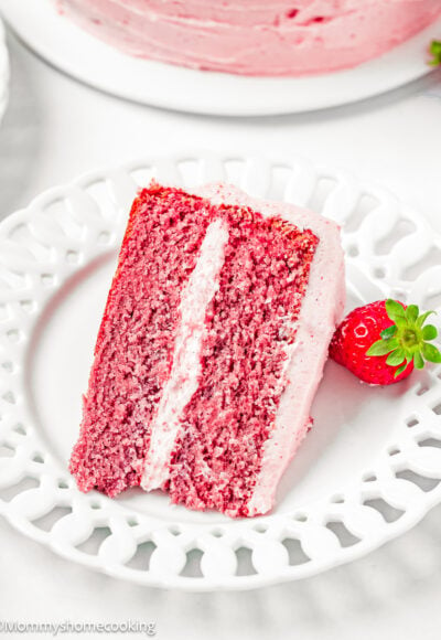 a slice of Easy Fresh Strawberry Cake made from scratch on a white plate.