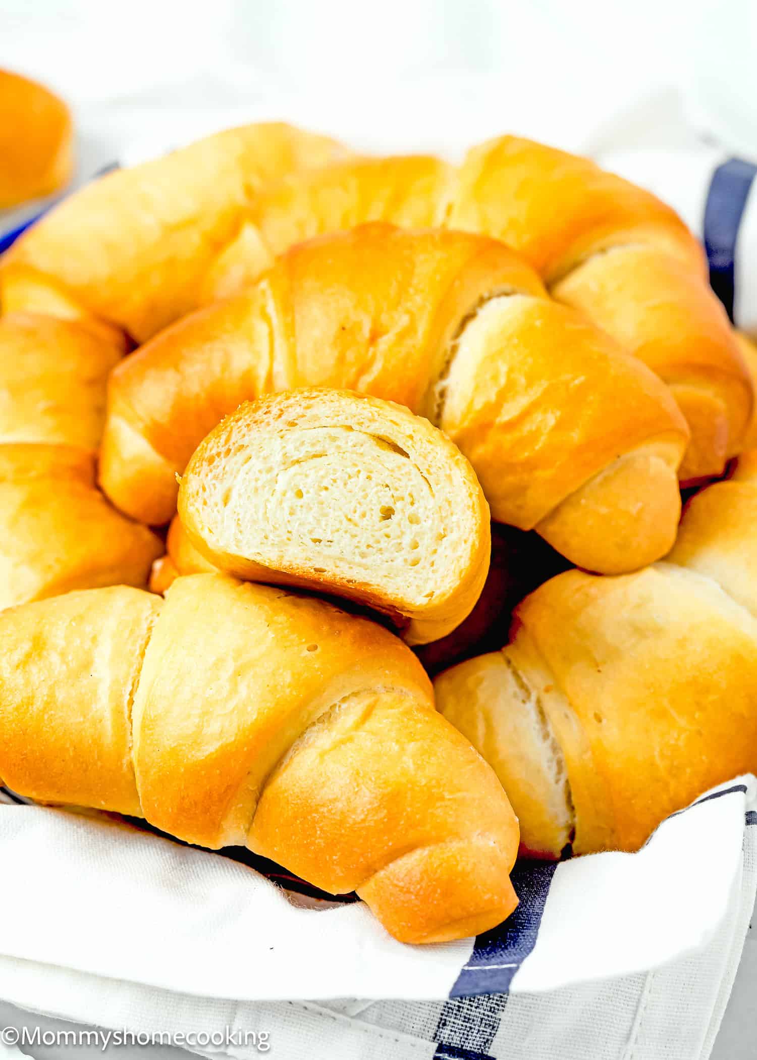 Homemade Eggless Crescents Rolls in a bread basket.