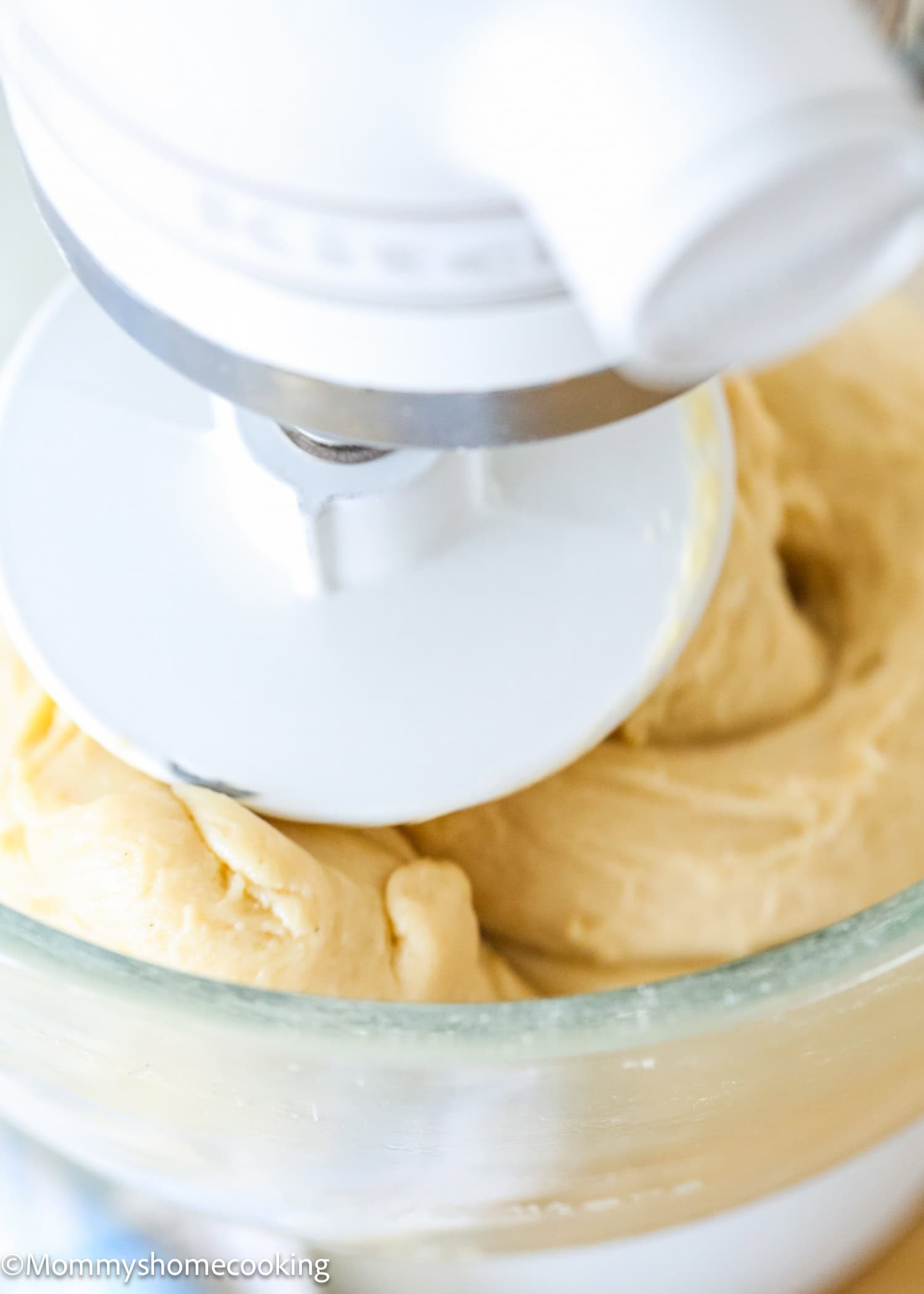 Homemade Eggless Crescents Rolls dough in stand mixer bowl.