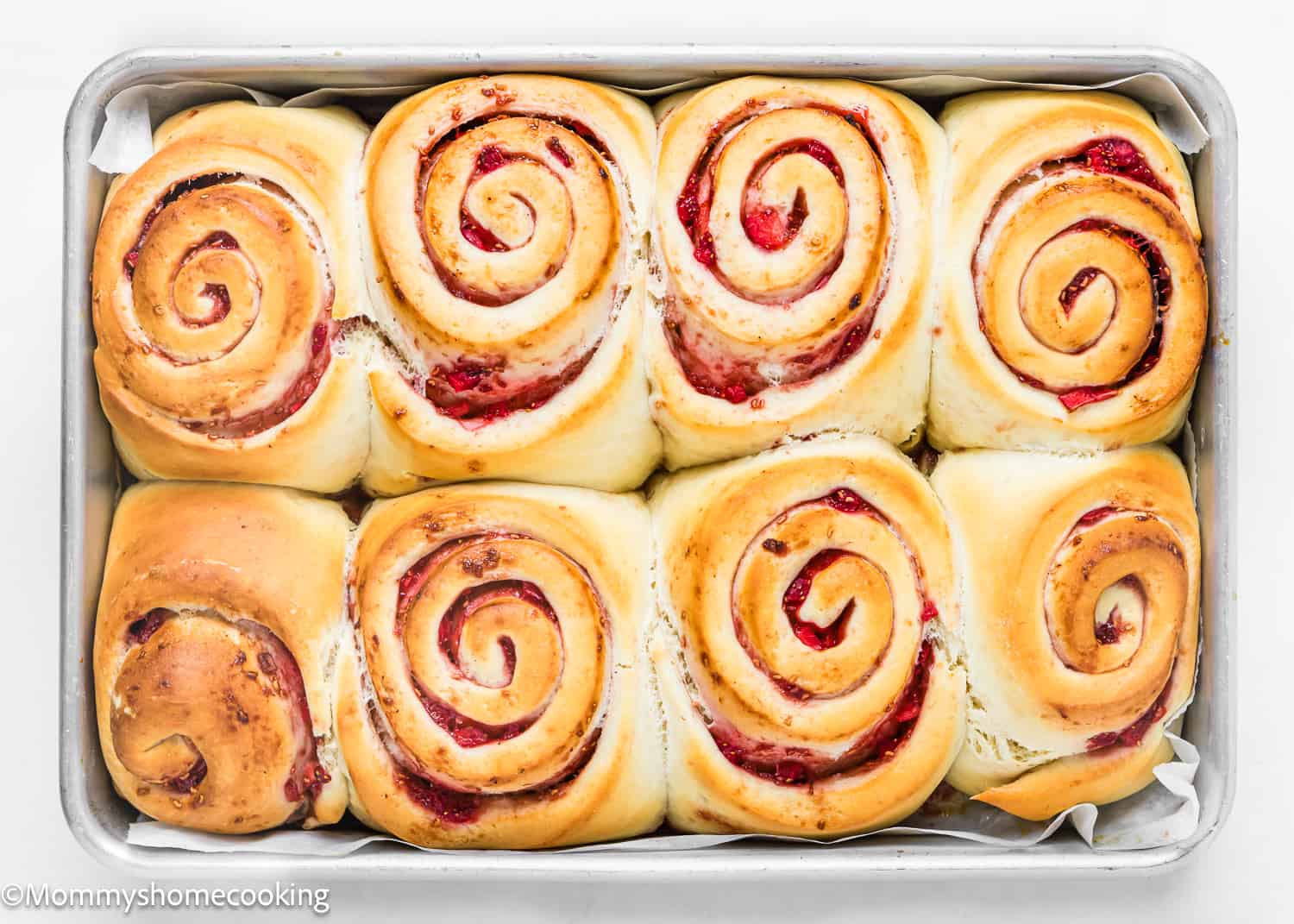 baked Strawberry Rolls in a baking tray.