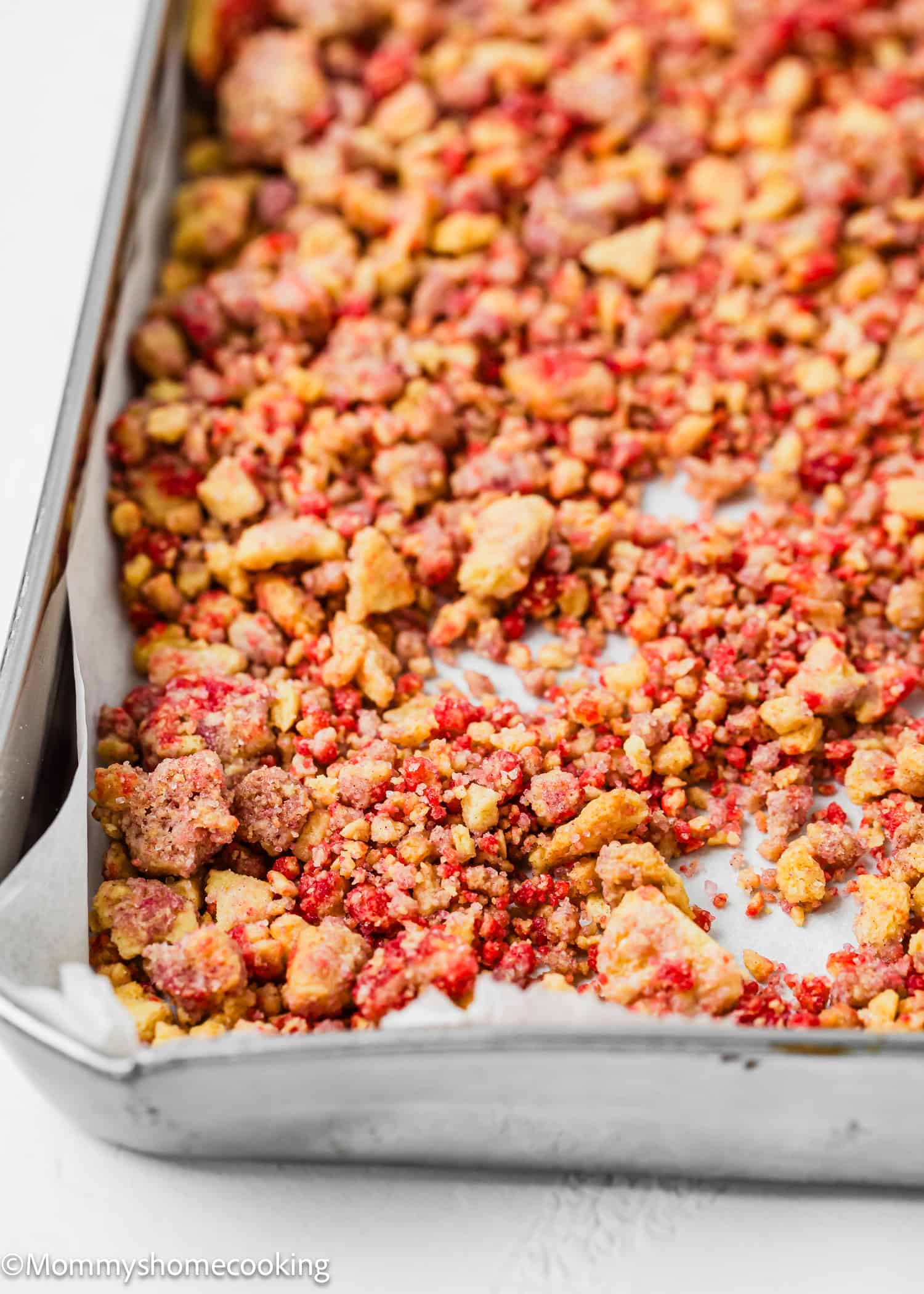 Strawberry Crunch topping in a baking tray.