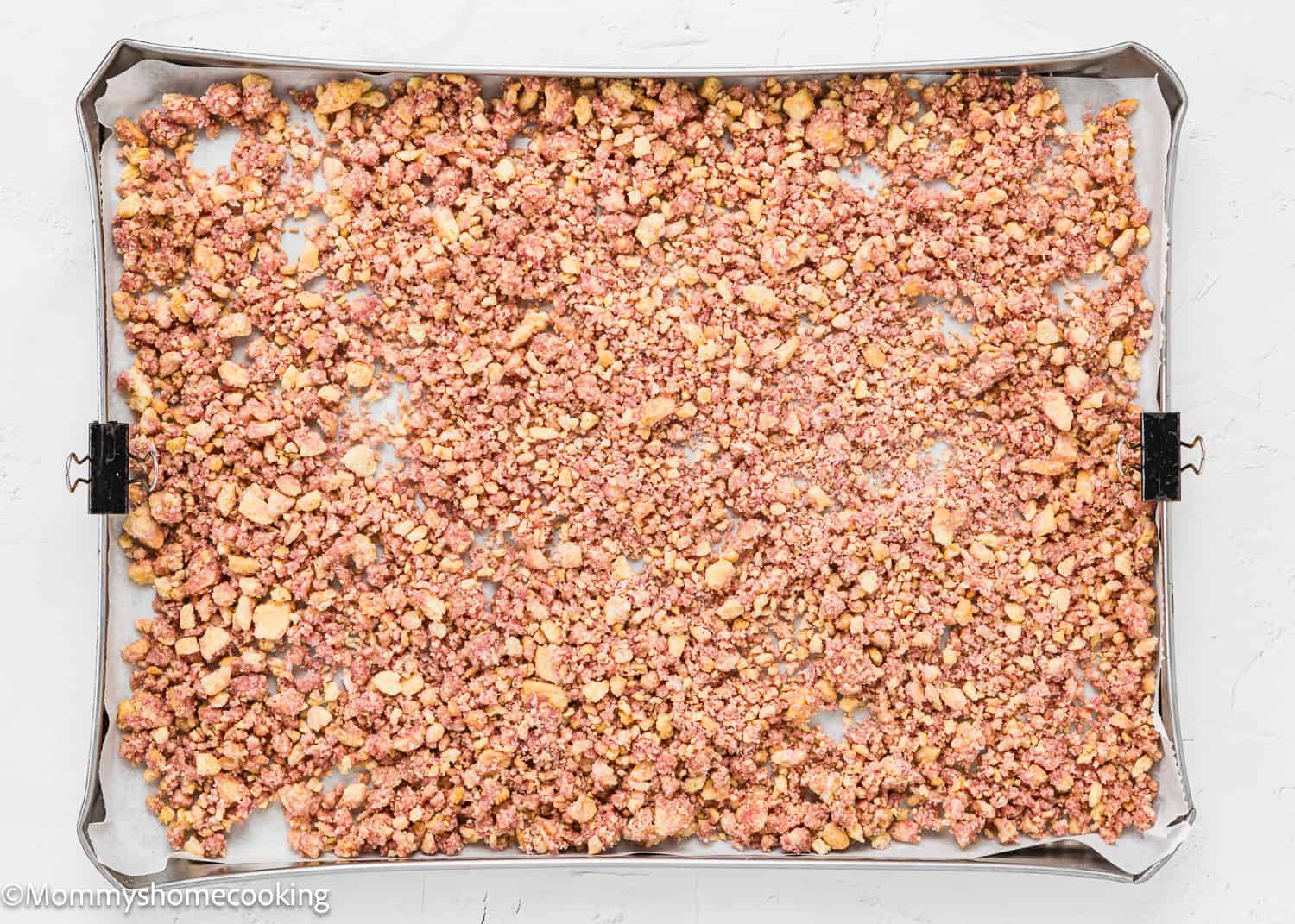 unbaked Strawberry Crunch dessert topping in a baking tray.
