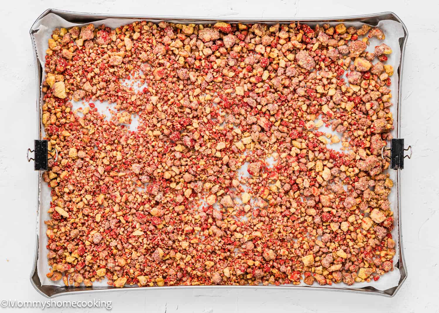 baked Strawberry Crunch dessert topping in a baking tray.