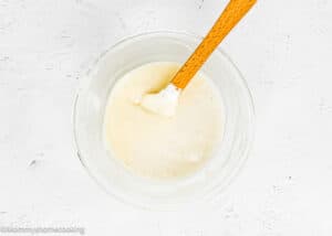 mixed cream cheese and butter in a bowl.