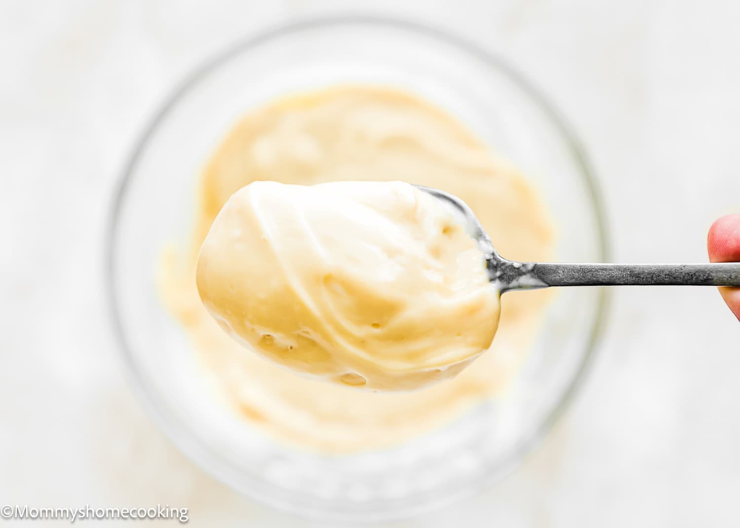 a spoon with vegan pastry cream custard.