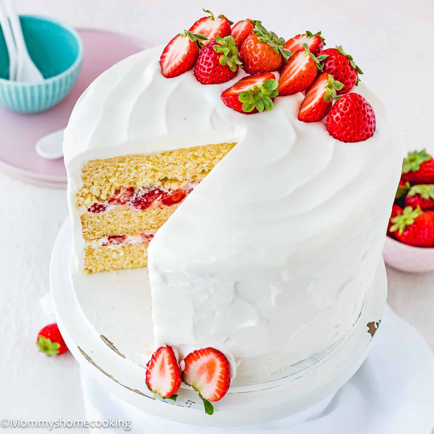 eggless strawberry shortcake cake frosted with Easy Whipped Cream Frosting.