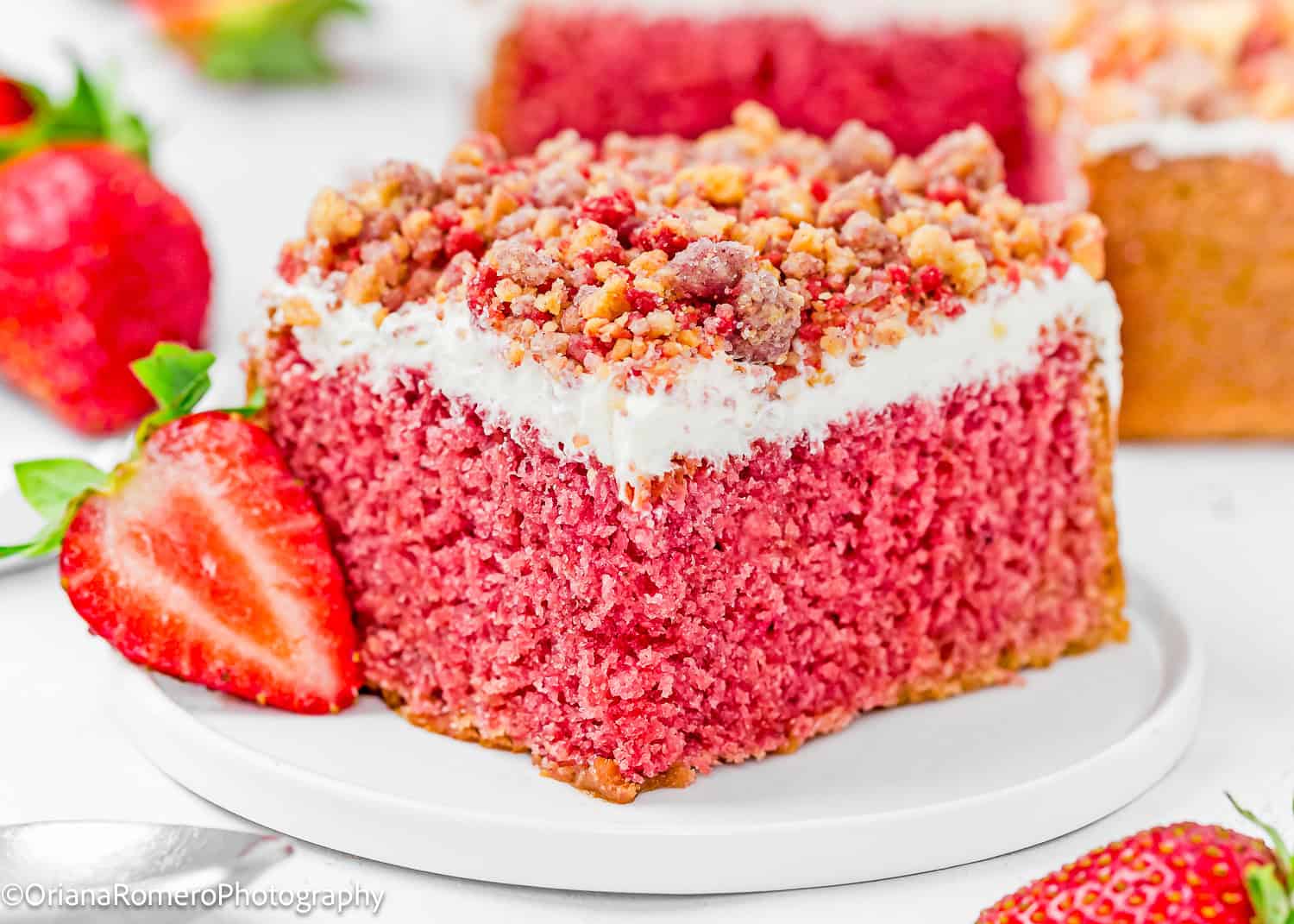 Eggless Strawberry Crunch Cake slice on a plate.