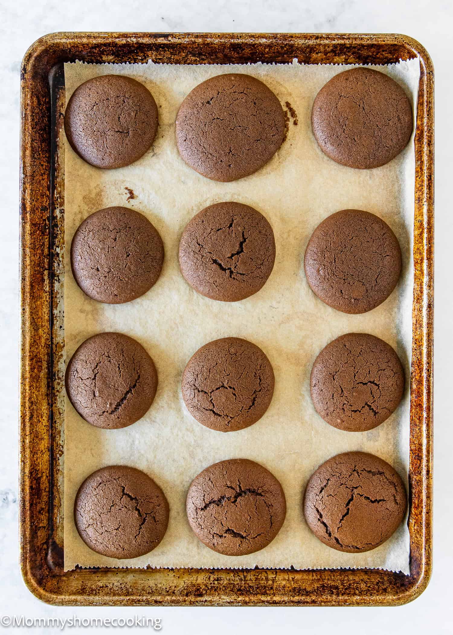baked Chocolate Whoopie Pies in a baking tray.