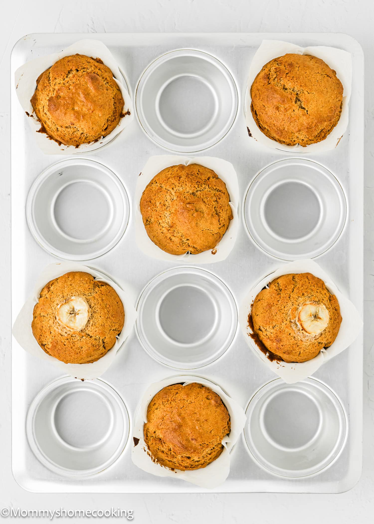 baked Healthy Vegan Easy Banana Muffins in a muffins tin.