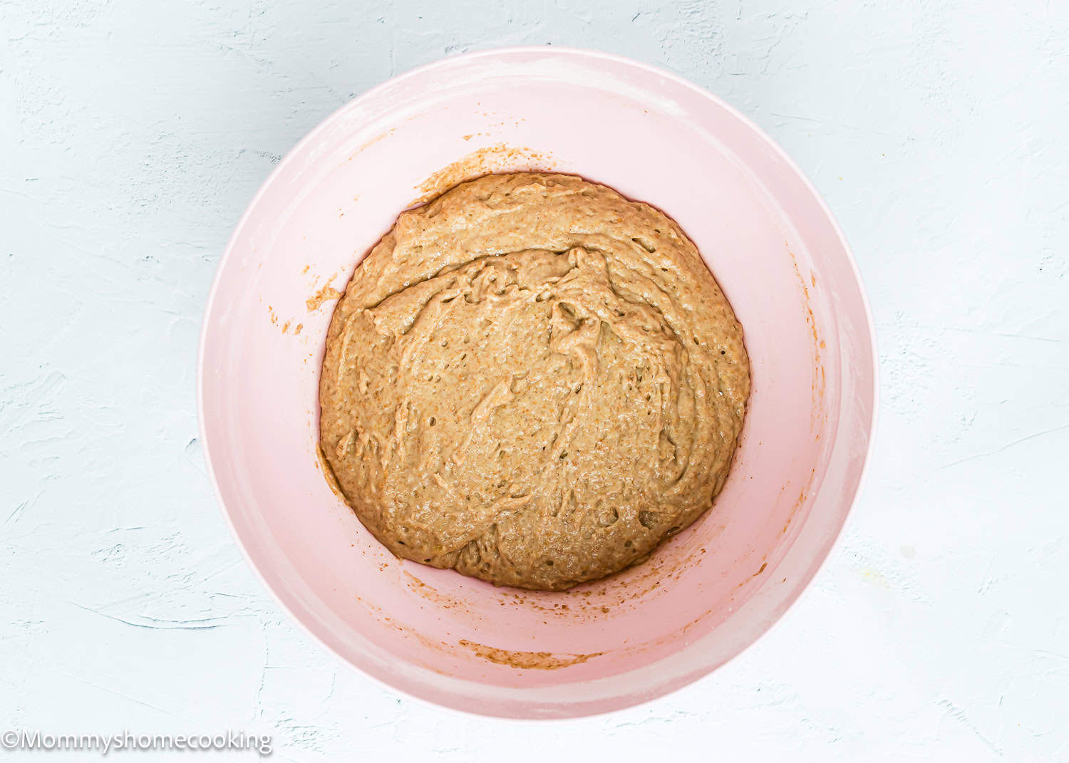 Healthy Egg-Free, dairy-free and Vegan Mini Banana Muffins batter in a bowl.