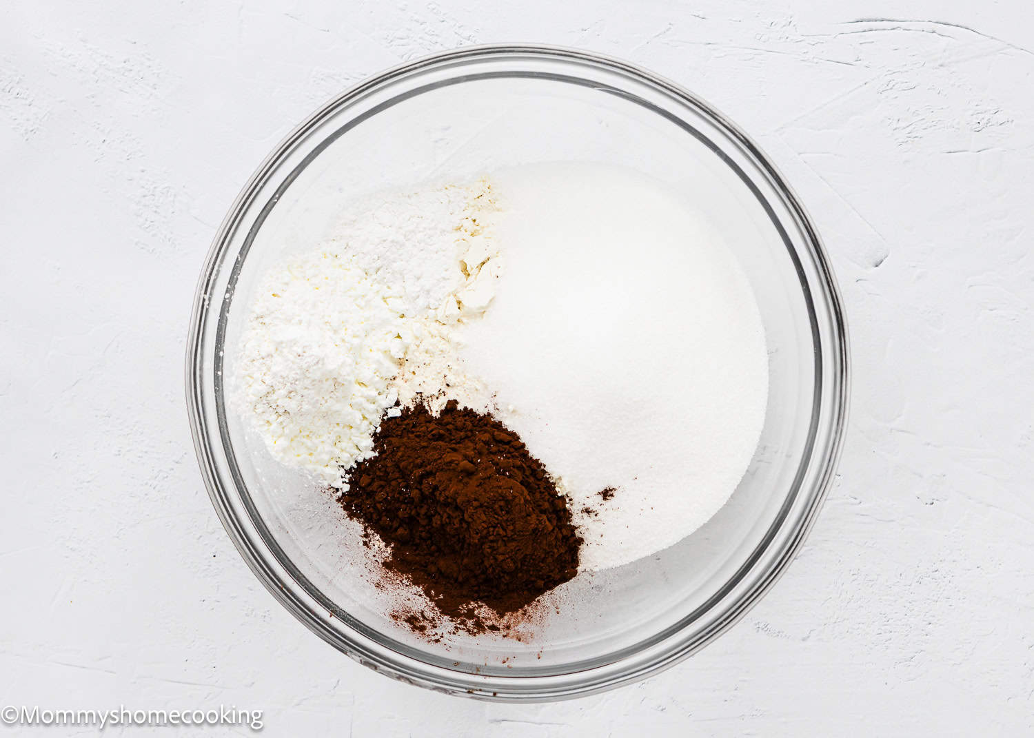 dry ingredients to make baked Vegan Red Velvet Cupcakes in a bowl.