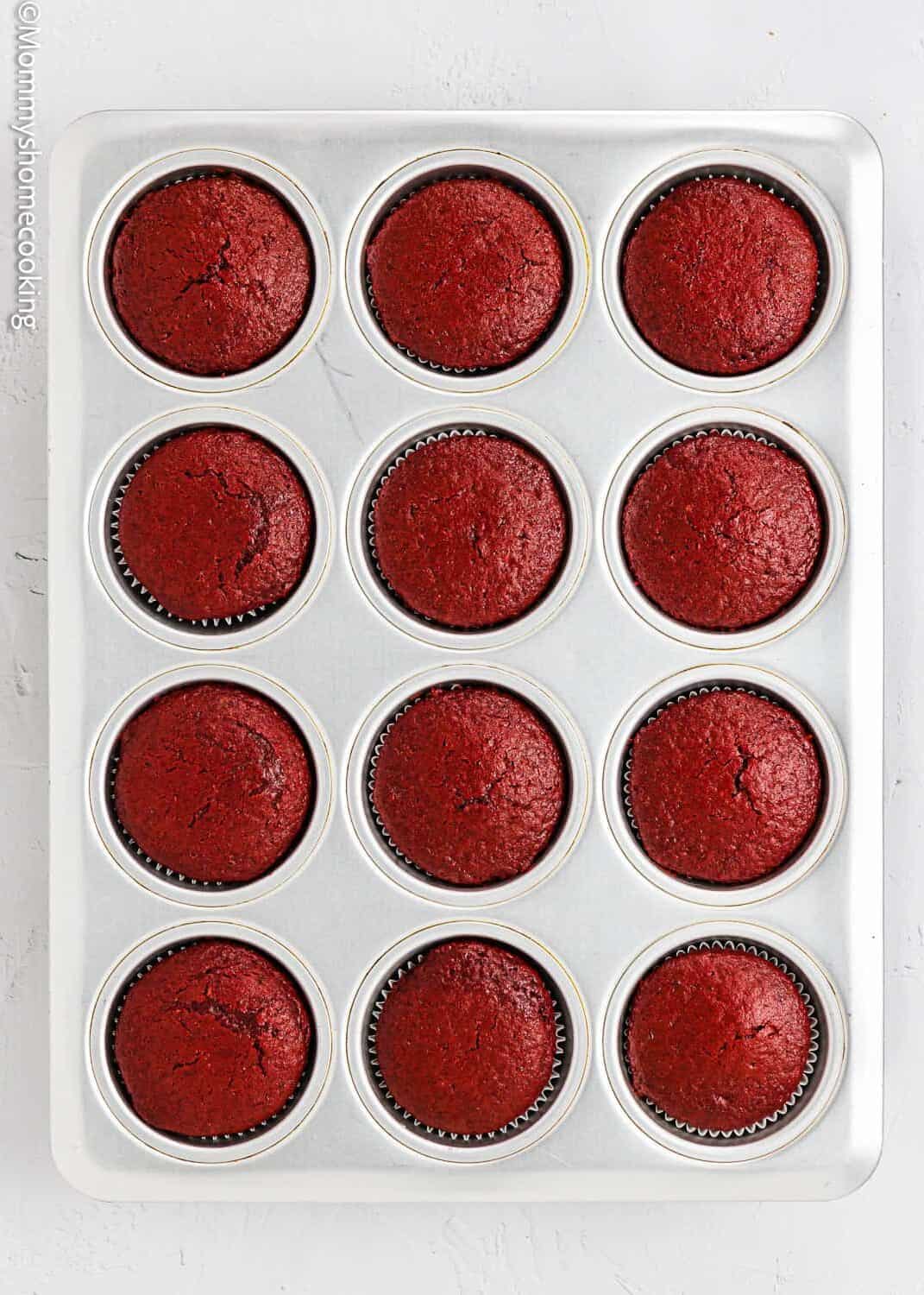 baked Vegan Red Velvet Cupcakes in a cupcake pan.