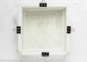 cake pan lined with parchment paper.
