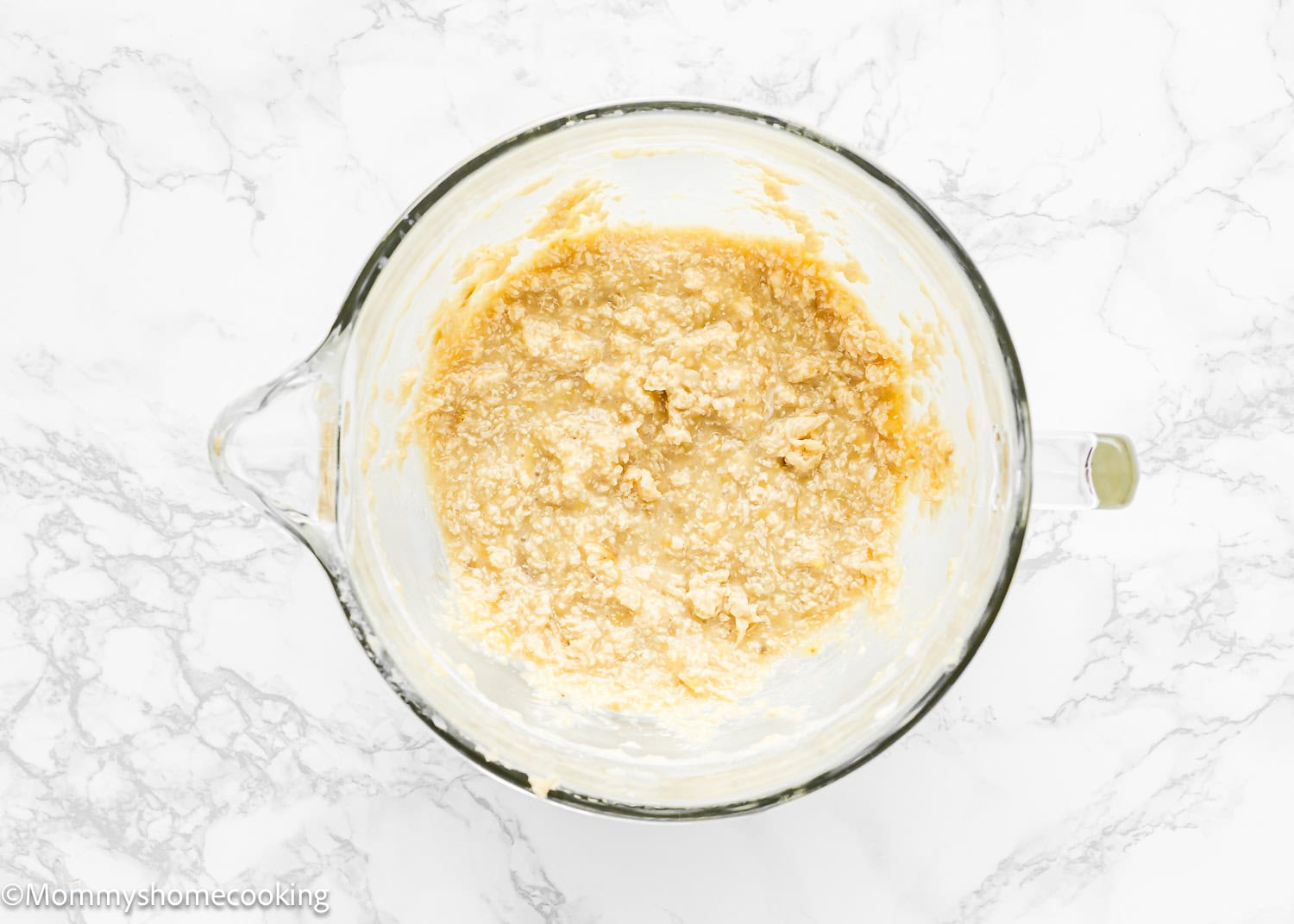 wet ingredients to make Eggless Brown Butter Banana Bundt Cake batter in a stand mixer bowl.