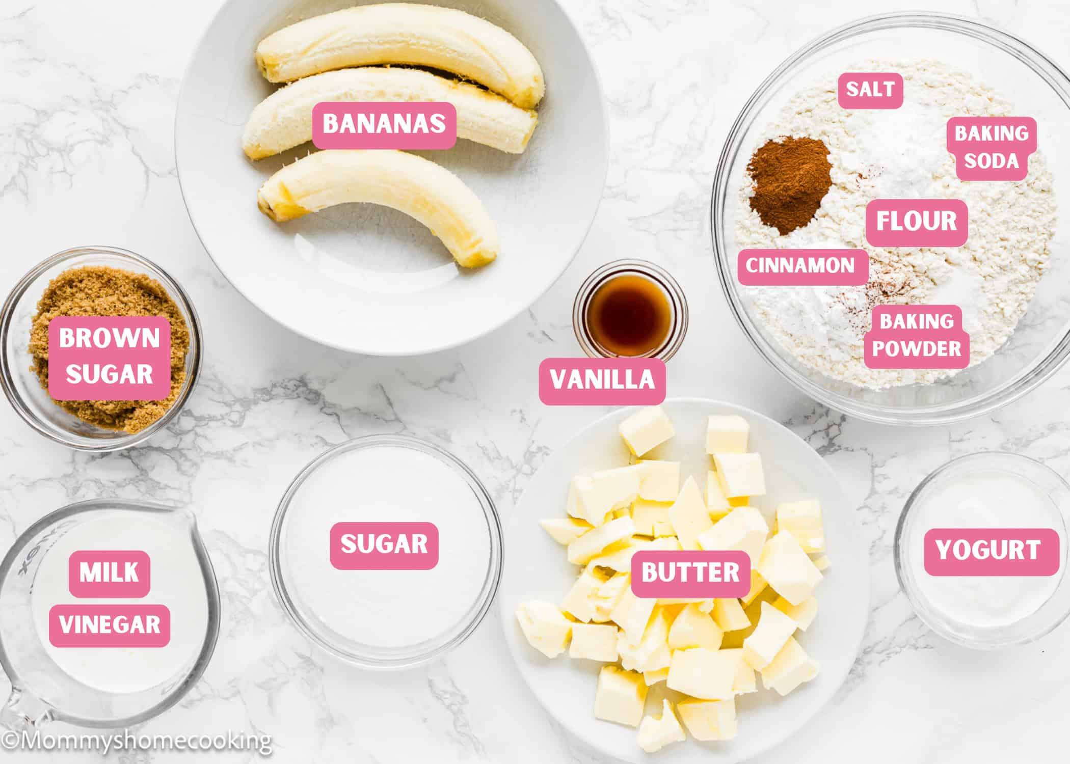 Ingredients needed to make Eggless Brown Butter Banana Bundt Cake over a marble surface with tag names.