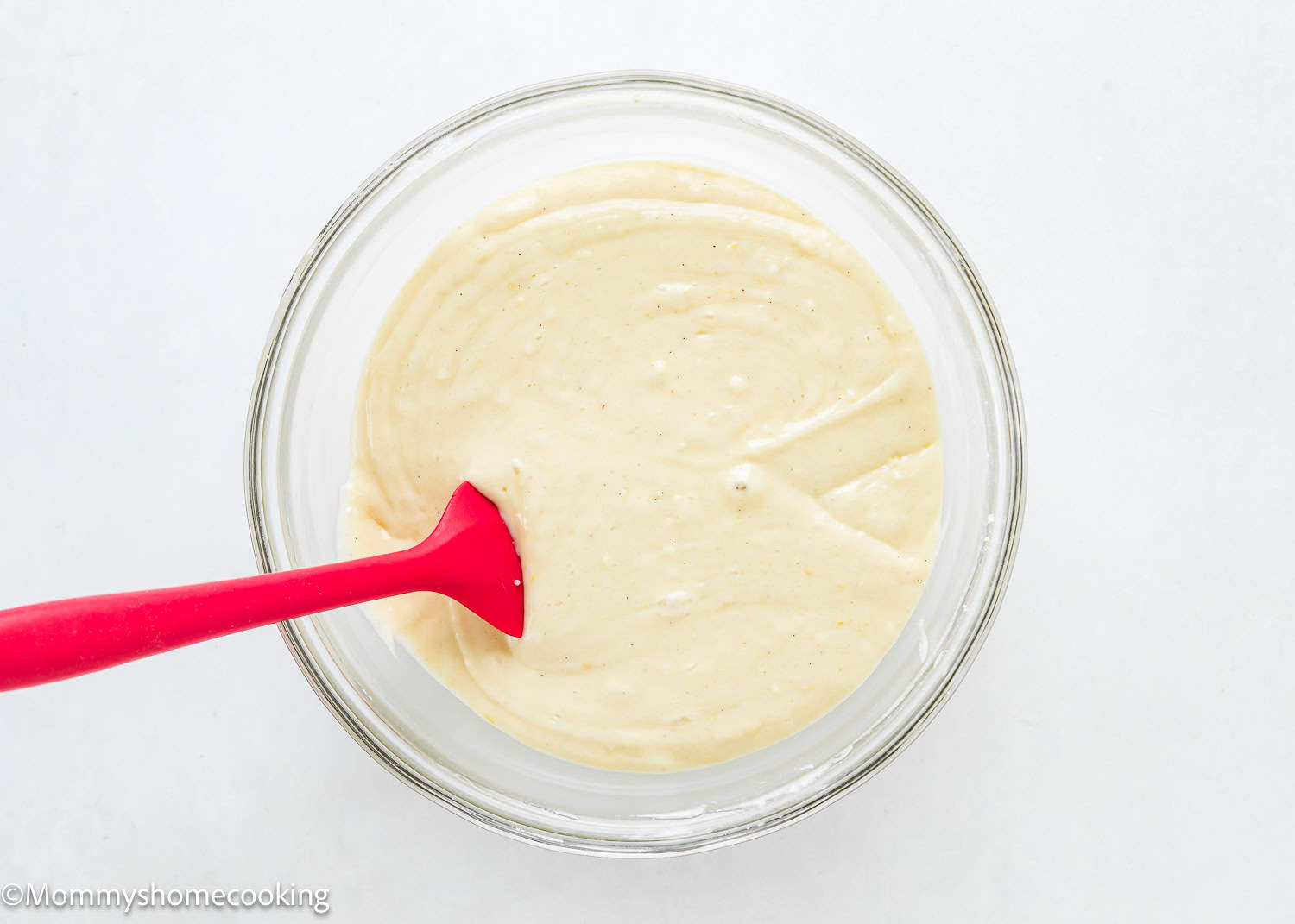 Easy Vegan Muffins batter in a bowl with a spatula.