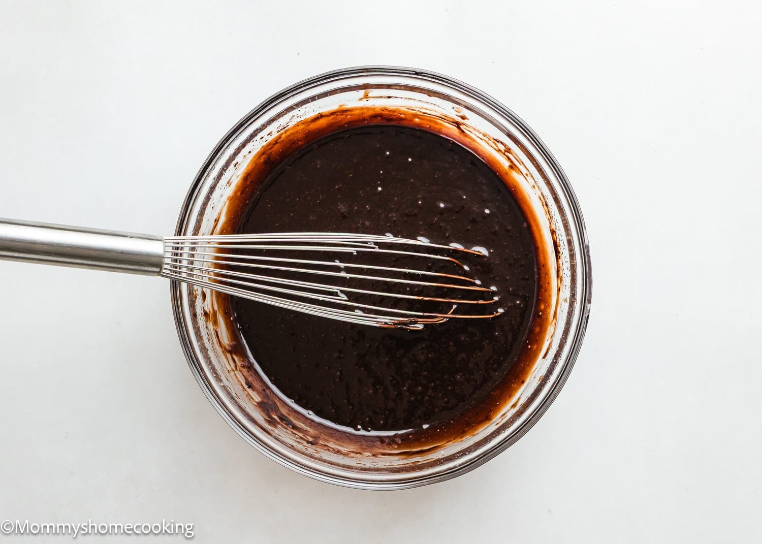wet ingredients mix together in a bowl to make brownies. 