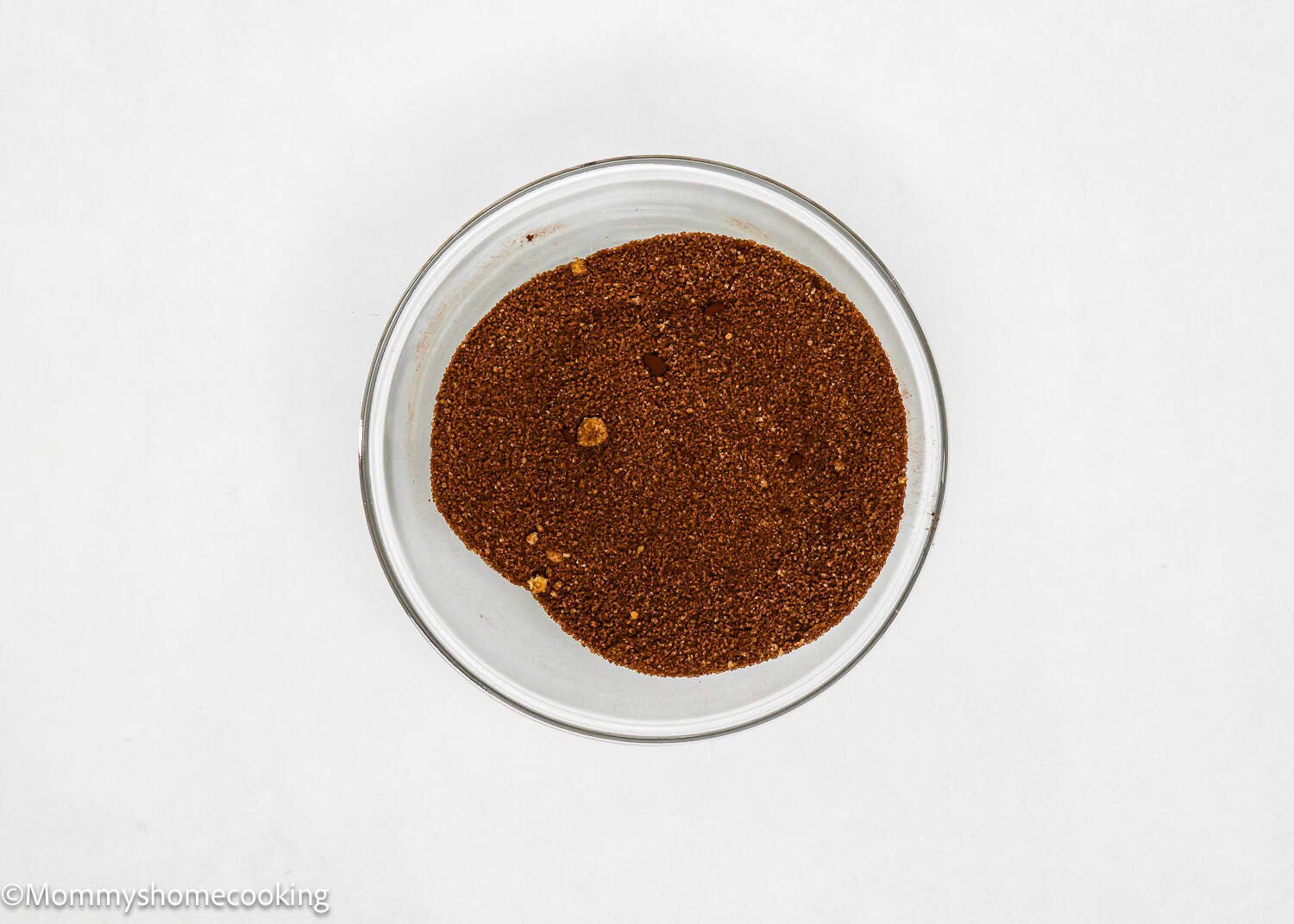 Chocolate mixture filling for cinnamon rolls in a bowl. 