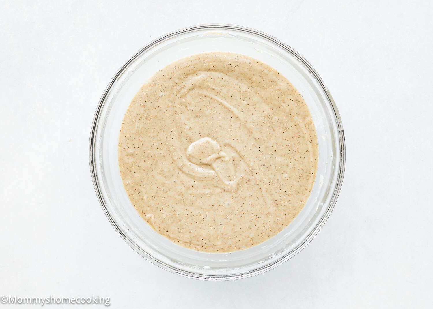 Eggless Easy Apple Upside Down Cake batter in a bolw.