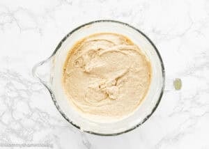 Eggless Banana Layer Cake batter in a stand mixer bowl.