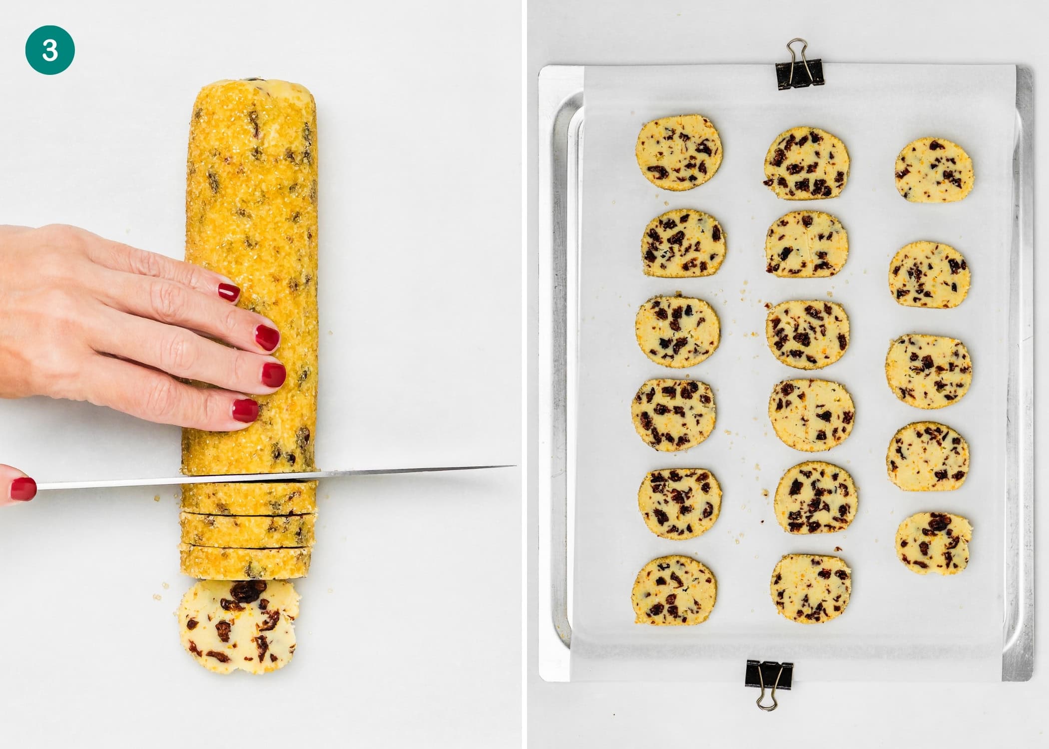 A hand slices a log of Eggless Cranberry Orange Icebox Cookies dough with visible chocolate bits; sliced pieces are arranged on a baking sheet lined with parchment paper.