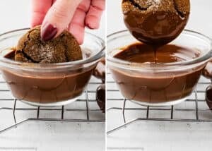 A hand dips an Eggless Chocolate Ginger Cookie halfway into a bowl of melted chocolate, with chocolate dripping off the cookie over a cooling rack.