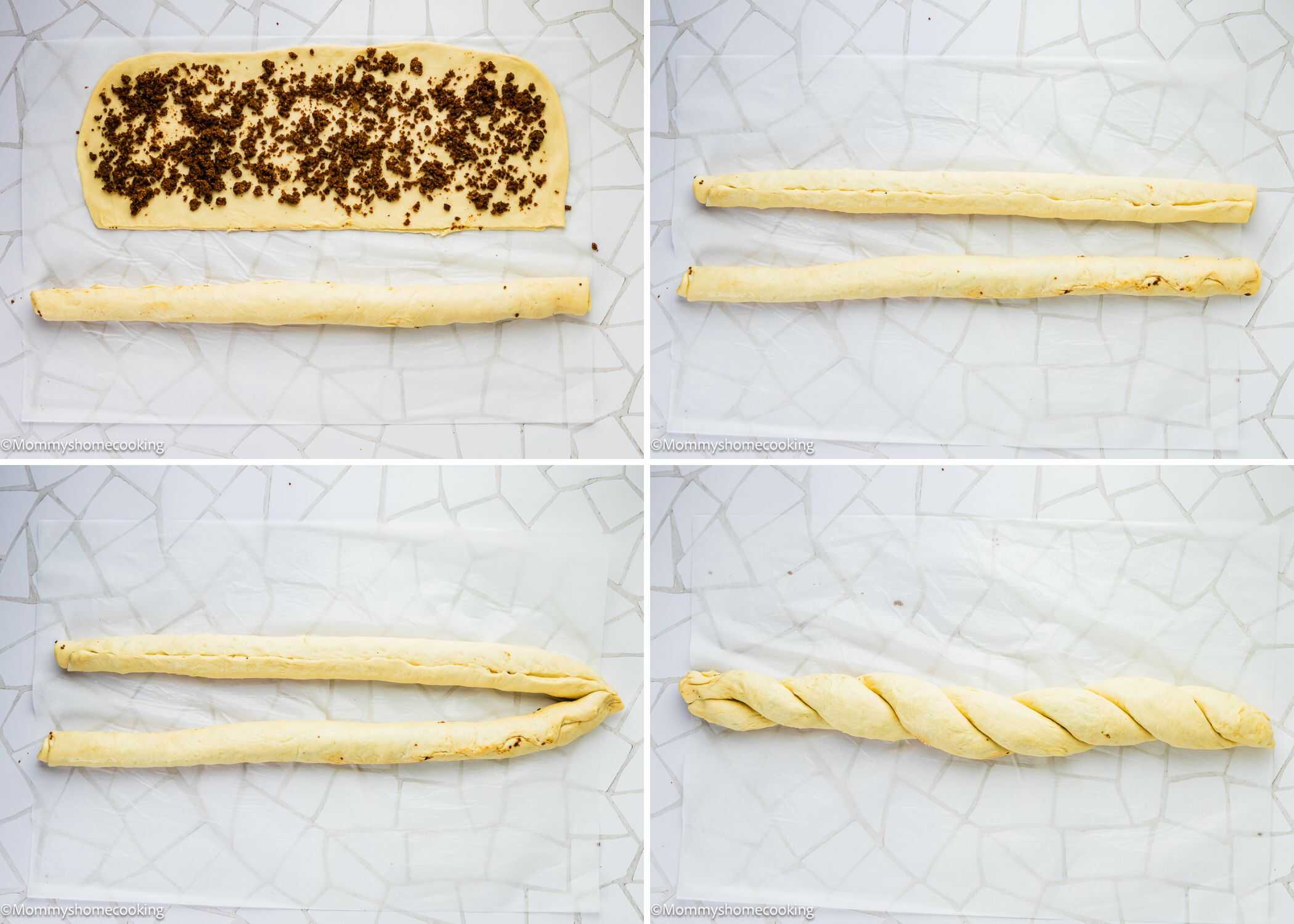 A rectangle of dough with filling is rolled into a log, sliced lengthwise, and the two halves are twisted together on a white surface to create the Best Eggless Mardi Gras King Cake.